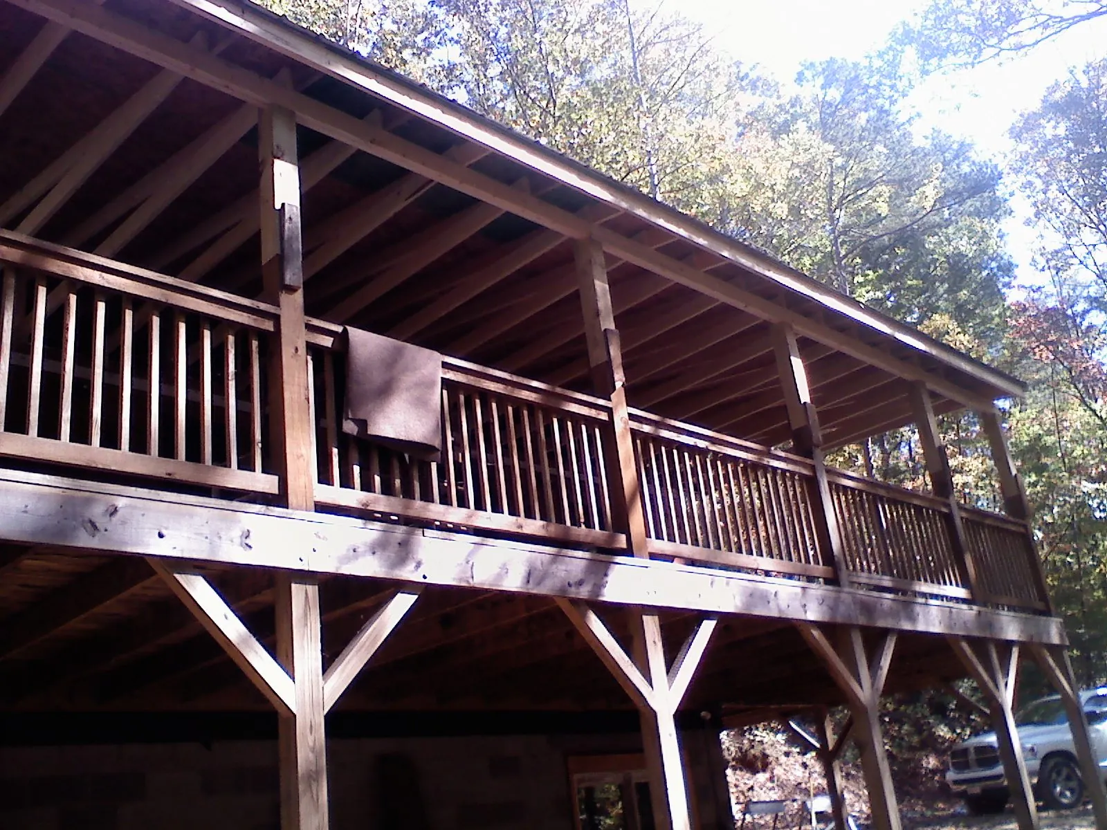 Timber framing under a new elevated porch and deck — Roof Leak Repair in Texas City by Roofing Brothers